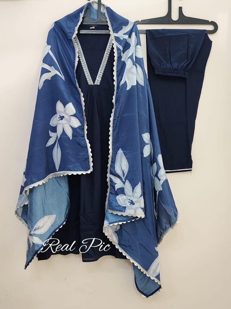 blue kurti set,blue salwar kameez,blue cotton kurti,embroidered blue kurti,pakistani style suit,handcrafted cotton suit,women kurti pant set,blue ethnic wear,traditional indian dress,party wear kurti set,blue kurta with dupatta,three piece kurti set,blue festival wear,salwar kameez for women,cotton kurti for women,blue embroidered suit,ready to wear kurti set,blue pakistani kurta,stylish blue outfit,elegant blue salwar suit,blue ethnic suit design,women’s traditional outfit,trendy blue kurti look,soft cotto
