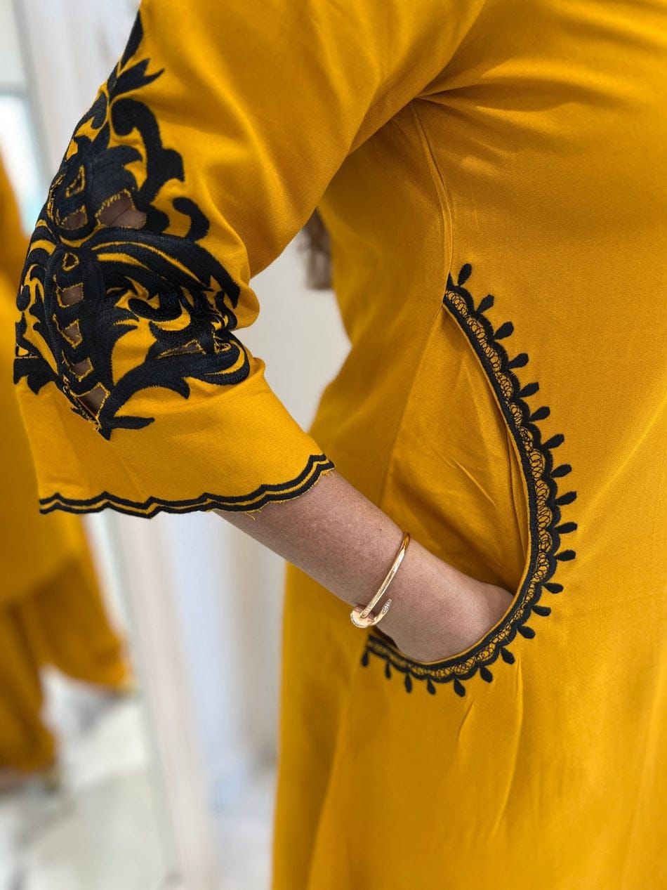 mustard kurti set,mustard yellow kurti,afghani plazo suit,heavy rayon kurti,embroidered kurti set,mehendi outfit for women,haldi function dress,stylish kurti with pockets,ethnic wear for women,mustard plazo set,heavy embroidery kurti,mustard kurta plazo set,kurti for festive wear,haldi outfit ideas,women's ethnic suit,plazo kurti combo,rayon kurti set,indian traditional wear,trendy kurti design,pocket kurti set,kurti with embroidery sleeves,mustard indo western kurti,mehandi ceremony dress,modern ethnic out