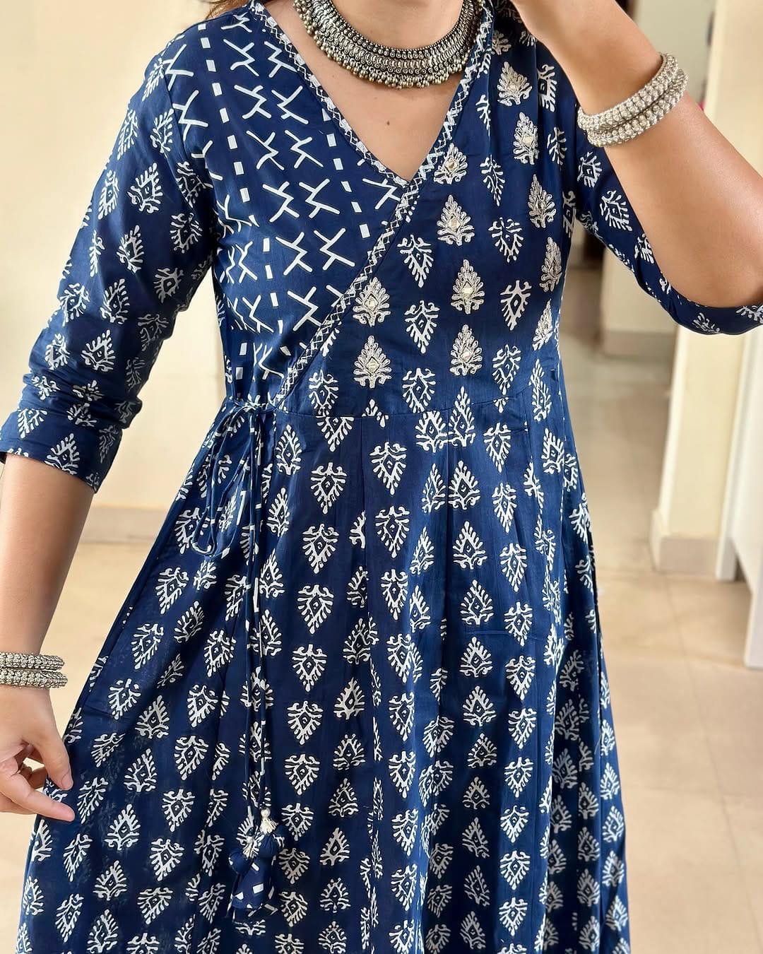 purple anarkali gown,purple angrakha kurti,cotton anarkali kurti,sanganeri print kurti,traditional angrakha dress,anarkali kurti set,jaipuri print gown,purple ethnic gown,block print anarkali,adda work kurti,flared cotton gown,kurti with dupatta set,ethnic wear for women,purple festive dress,boho indian kurti,long flare kurti set,desi angrakha kurti,anarkali with side tie up,women cotton suit set,printed gown style kurti,3 piece anarkali set,purple kurti pant set,sleeve 3/4 kurti,purple traditional wear,cas
