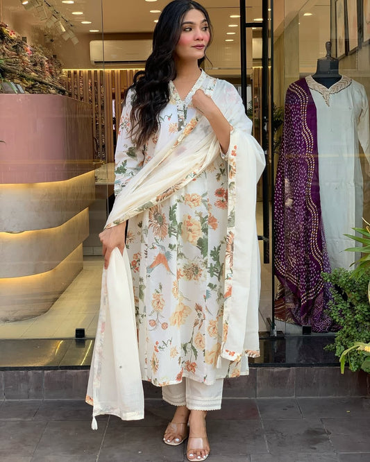 mughal block print kurti,digital print kurta set,three piece cotton suit,premium mul cotton kurti,designer kurti pant set,v neck yoke kurta,set with dupatta and pant,mul cotton suit set,floral printed kurti,ethnic wear for women,summer cotton kurti set,traditional kurta pant set,block printed ethnic wear,soft cotton kurti,mulmul cotton dress,kurti with printed dupatta,ready to wear ethnic set,indian kurti for women,stylish casual kurti set,floral yoke kurti,hand block print suit,premium digital print kurta,