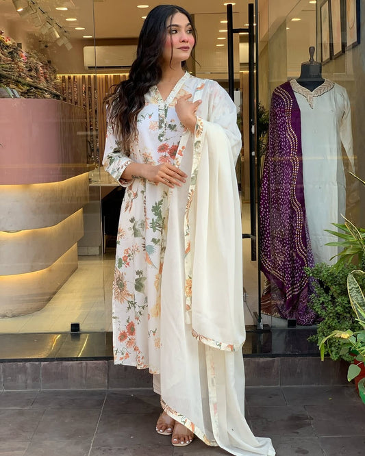 mughal block print kurti,digital print kurta set,three piece cotton suit,premium mul cotton kurti,designer kurti pant set,v neck yoke kurta,set with dupatta and pant,mul cotton suit set,floral printed kurti,ethnic wear for women,summer cotton kurti set,traditional kurta pant set,block printed ethnic wear,soft cotton kurti,mulmul cotton dress,kurti with printed dupatta,ready to wear ethnic set,indian kurti for women,stylish casual kurti set,floral yoke kurti,hand block print suit,premium digital print kurta,