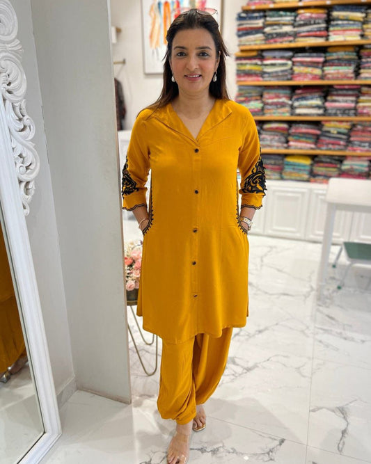 mustard kurti set,mustard yellow kurti,afghani plazo suit,heavy rayon kurti,embroidered kurti set,mehendi outfit for women,haldi function dress,stylish kurti with pockets,ethnic wear for women,mustard plazo set,heavy embroidery kurti,mustard kurta plazo set,kurti for festive wear,haldi outfit ideas,women's ethnic suit,plazo kurti combo,rayon kurti set,indian traditional wear,trendy kurti design,pocket kurti set,kurti with embroidery sleeves,mustard indo western kurti,mehandi ceremony dress,modern ethnic out
