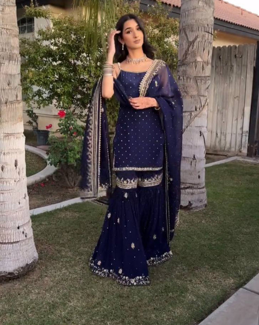 Sharara set for women,
Designer sharara suit,
Party wear sharara dress,
Wedding sharara outfit,
Ethnic sharara for girls,
Traditional sharara suit,
Festive wear sharara set,
Chinon silk sharara,
Heavy embroidery sharara,
Sharara suit with dupatta,
Bridal sharara dress,
Latest sharara designs,
Sharara kurta set,
Luxury sharara collection,
